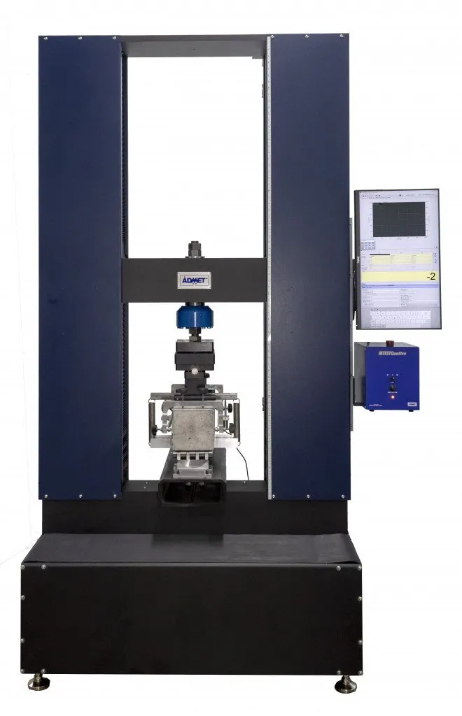 ASTM C1609 Fixture on ADMET's eXpert 2657 300 kN dual column