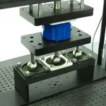 Custom three head test fixture for fatigue testing