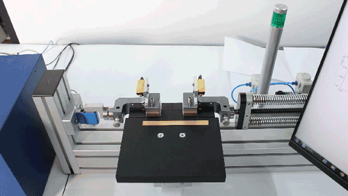 The green light turns on when the sample is properly aligned